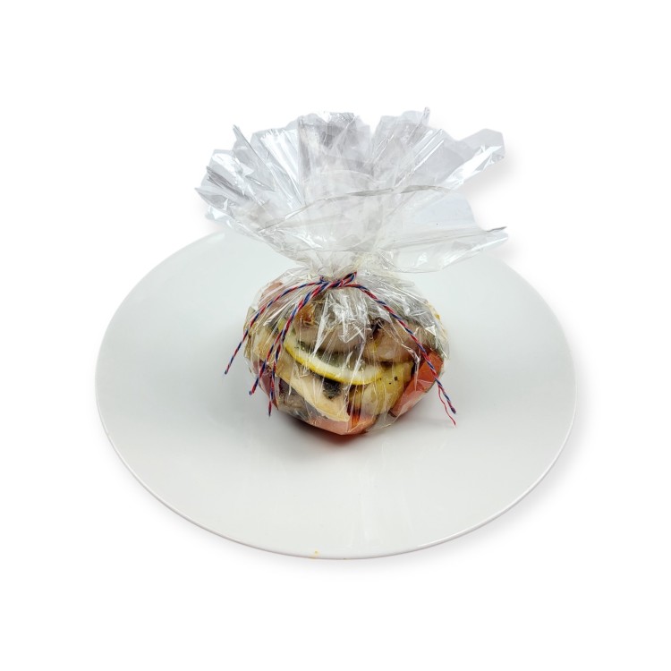 FILET DE DORADE EN PAPILLOTE AUX PETITS LEGUMES FILET DE DORADE EN PAPILLOTE AUX PETITS LEGUMES